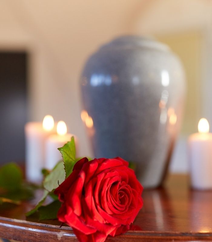 Red Rose and Cremation Urn with Candles<br />
